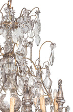 Load image into Gallery viewer, A 19th Century French Louis XV Style Crystal And Gilt Twelve-Light Chandelier