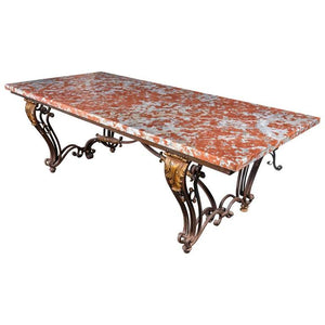 An Early 20th Century French Orange Marble-Top Table On Wrought Iron Base