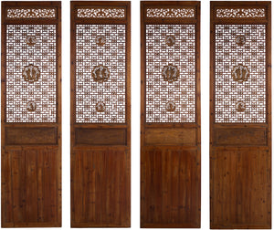 A SET OF FOUR CHINESE CARVED AND RETICULATED DOOR PANELS QING DYNASTY (1644-1912)