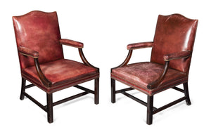 A Pair Of Late 19th-Early 20th Century Burgundy Leather Gainsborough Chairs