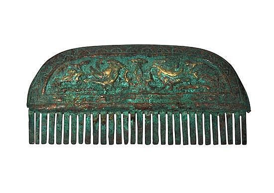 A CHINESE BRONZE COMB, HAN DYNASTY