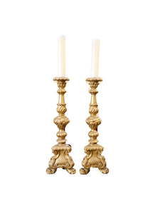 A PAIR OF ANTIQUE STYLE ITALIAN CARVED AND GILT PRICKET CANDLESTICKS