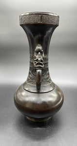 A Japanese Carved Bronze Bottle Vase with Two Handles, Meiji Period