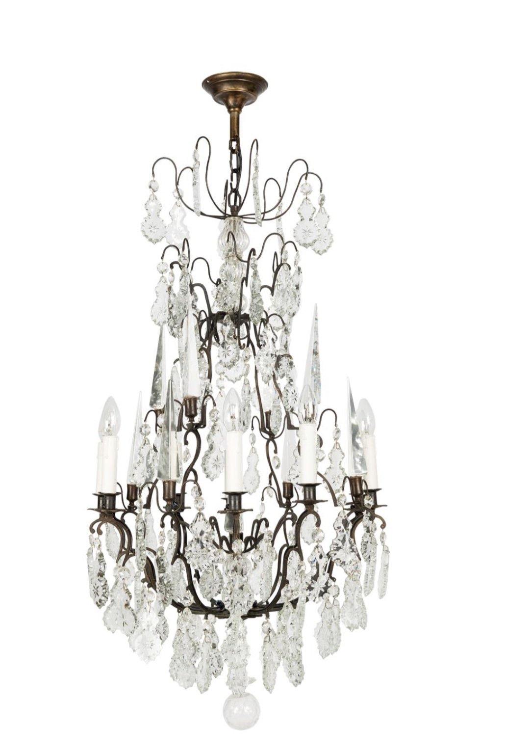 A FRENCH BRONZE AND CRYSTAL EIGHT LIGHT CHANDELIER, CIRCA 1920 - Fine Classic Antiques