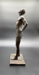 A Bronze Figure of a Runner, Early 20th Century