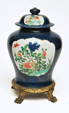 A CHINESE COVERED VASE WITH A GILT METAL BASE, 19TH CENTURY