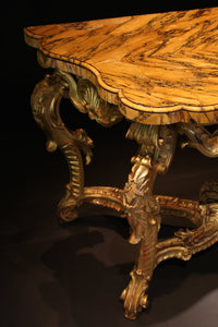 A ROMAN ROCOCO GILTWOOD CONSOLE TABLE MID 18TH CENTURY