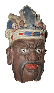 A POLYCHROME STUCCO HEAD OF A GUARDIAN FIGURE, YUAN DYNASTY